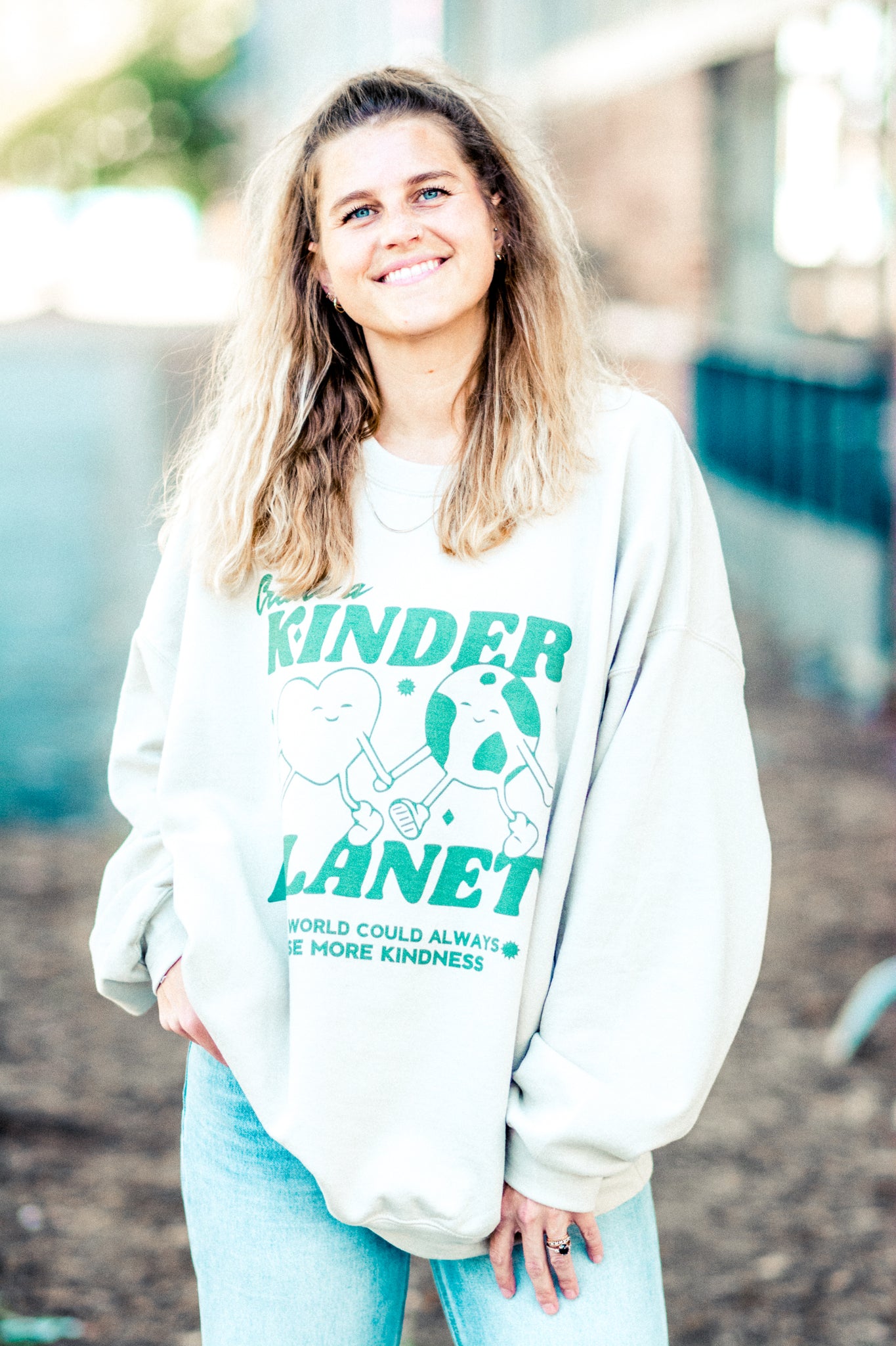 KINDER PLANET GRAPHIC SWEATSHIRT IN STONE KITS BRAND  affordable Womens and Mens trendy online streetwear fashion boutique 