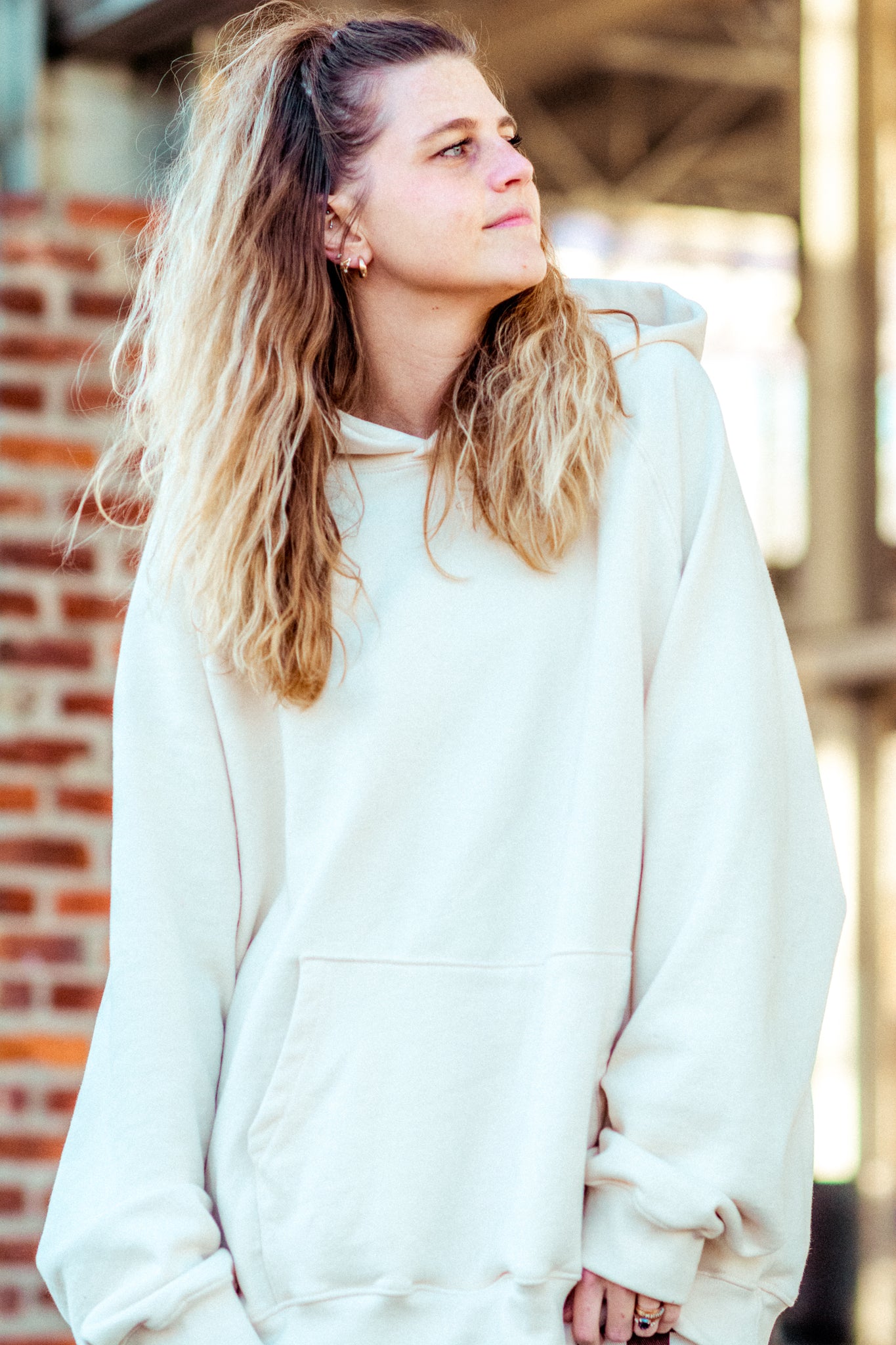 ESSENTIALS HOODIE IN CREAM KITS BRAND  affordable Womens and Mens trendy online streetwear fashion boutique 